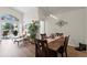 Comfortable dining area with views of the patio and pool, perfect for indoor-outdoor living at 10361 Lightner Bridge Dr, Tampa, FL 33626