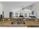 Kitchen area featuring granite countertops and stainless steel sink at 10361 Lightner Bridge Dr, Tampa, FL 33626