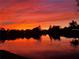Sunset over the lake behind the property at 10361 Lightner Bridge Dr, Tampa, FL 33626