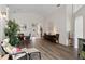 Spacious living area with dining table, stylish furnishings, and plenty of natural light at 10361 Lightner Bridge Dr, Tampa, FL 33626