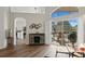 Open-concept living area with dining room and a view to outdoor patio with barbecue at 10361 Lightner Bridge Dr, Tampa, FL 33626
