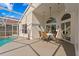 Outdoor patio with stylish wicker furniture, ideal for relaxing and enjoying the poolside at 10361 Lightner Bridge Dr, Tampa, FL 33626