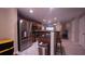 Kitchen featuring stainless steel appliances, wood cabinets, and modern finishes at 10819 Lake Saint Charles Blvd, Riverview, FL 33578