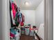 Walk-in closet is equipped with shelving and hanging space for optimal organization at 11704 Orange Grove Ter, Riverview, FL 33569