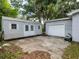 Image features a large detached garage with yard at 11704 Orange Grove Ter, Riverview, FL 33569