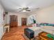 Bright and open living area with hardwood floors, great for entertaining, and open to other rooms at 11704 Orange Grove Ter, Riverview, FL 33569