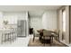 Open concept dining area with modern furnishings, adjacent to the kitchen and stainless steel refrigerator at 11716 Brae Way, Dade City, FL 33525