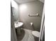 Contemporary half-bathroom featuring a stylish sink and a modern toilet at 11847 Dumaine Valley Rd, Riverview, FL 33579