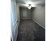Comfortable bedroom has neutral carpet and walls and a ceiling fan and a window with blinds at 11847 Dumaine Valley Rd, Riverview, FL 33579