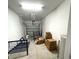 Spacious garage with an automatic door provides secure parking and extra storage at 11847 Dumaine Valley Rd, Riverview, FL 33579