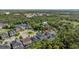 Beautiful aerial view of homes with private pools backing to a conservation area and serene pond at 12121 Rustic River Way, Tampa, FL 33635