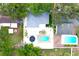 Aerial shot of home showcasing the backyard pool and the layout of the property at 1317 S Betty Ln, Clearwater, FL 33756