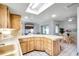 Spacious kitchen with ample counter space, seamlessly connects to the dining and office areas at 1363 Cottage Grove Rd, Tarpon Springs, FL 34689