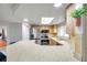 Bright kitchen features stainless steel appliances and eat-in bar area, creating a functional and bright space at 1363 Cottage Grove Rd, Tarpon Springs, FL 34689