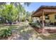 This backyard is set up for entertaining or just relaxing in a private oasis at 153 Alpine Ct, Bradenton, FL 34208