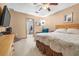 Comfortable bedroom featuring soft carpet, neutral walls, and ample closet space for easy storage at 153 Alpine Ct, Bradenton, FL 34208