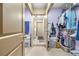 Hallway featuring access to laundry room and closet providing convenient access to amenities at 153 Alpine Ct, Bradenton, FL 34208
