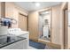 Functional laundry room with washer, dryer, and access to a bathroom for added convenience at 153 Alpine Ct, Bradenton, FL 34208