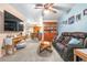 Inviting living room showcases an open floor plan leading to the kitchen and a comfortable seating area at 153 Alpine Ct, Bradenton, FL 34208