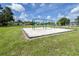 Community park featuring a playground with swings on a green lawn for to enjoy outdoors at 153 Alpine Ct, Bradenton, FL 34208