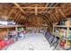 The interior of the shed is organized with shelves for storage and a gravel floor at 153 Alpine Ct, Bradenton, FL 34208