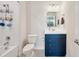 Clean bathroom featuring a vanity with sink, a toilet, and a tub with showerhead at 18144 Frame Bnd, Land O Lakes, FL 34638
