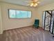 Bedroom with a window and comfortable chair at 2070 World Parkway Blvd # 36, Clearwater, FL 33763