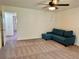 Cozy living room with carpet and sofa at 2070 World Parkway Blvd # 36, Clearwater, FL 33763
