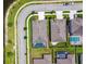 The roof and pool are viewed from above, showing well maintained community landscaping around the house at 21837 Briske Morning Ave, Land O Lakes, FL 34637