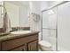 Bathroom featuring granite vanity, shower stall, and neutral walls at 21837 Briske Morning Ave, Land O Lakes, FL 34637