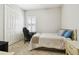 Bedroom features an organized closet, a desk with window view, and a full sized bed at 21837 Briske Morning Ave, Land O Lakes, FL 34637