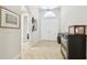 Light and airy foyer with tile flooring, leading to the main living areas at 21837 Briske Morning Ave, Land O Lakes, FL 34637