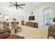 Open-concept living room and dining area featuring hardwood floors and natural light at 21837 Briske Morning Ave, Land O Lakes, FL 34637