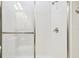 Clean tiled shower stall with clear glass doors and brushed metal fixtures at 21837 Briske Morning Ave, Land O Lakes, FL 34637