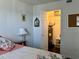 Bedroom view with a water heater closet, providing extra storage space at 25050 Sandhill Blvd # 8B1, Punta Gorda, FL 33983