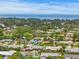 An aerial view shows the neighborhood, house and its proximity to the Sunshine Skyway Bridge at 2581 61St S Ave, St Petersburg, FL 33712