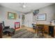 Bedroom featuring a desk, chair, rug, closet, and eclectic artwork at 2581 61St S Ave, St Petersburg, FL 33712