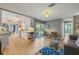 Open floor plan showcasing the kitchen and living room with hardwood floors at 2581 61St S Ave, St Petersburg, FL 33712