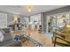 Open living area with kitchen access and sliding doors to the outdoor patio at 2581 61St S Ave, St Petersburg, FL 33712