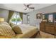 Spacious main bedroom with pool views and a large dresser at 2581 61St S Ave, St Petersburg, FL 33712