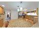 Bright kitchen with stainless steel appliances, granite countertops, and breakfast table at 3035 Countryside Blvd # 16B, Clearwater, FL 33761