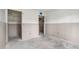 A partially constructed bedroom with doorways leading to a closet and bathroom at 326 Moorings Cove Dr # 2B, Tarpon Springs, FL 34689