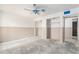 Unfinished bedroom featuring drywall, two closets and open space, ready for personalization at 326 Moorings Cove Dr # 2B, Tarpon Springs, FL 34689