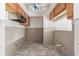 Unfinished kitchen with cabinetry, exhaust fan and drywall, ready for customization at 326 Moorings Cove Dr # 2B, Tarpon Springs, FL 34689