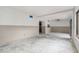 Spacious living room featuring large windows and open layout at 326 Moorings Cove Dr # 2B, Tarpon Springs, FL 34689