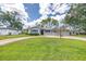 Charming single-story home with a well-manicured lawn, mature trees, and an inviting front entrance at 3652 18Th N Ave, St Petersburg, FL 33713