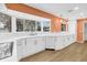 Modern kitchen featuring white cabinets, quartz countertops, and lots of natural light at 3652 18Th N Ave, St Petersburg, FL 33713
