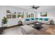 Inviting living room showcasing stylish furniture, wood floors and large windows at 3652 18Th N Ave, St Petersburg, FL 33713