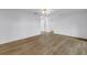 Spacious room featuring light wood flooring and a view of the home's interior at 3652 18Th N Ave, St Petersburg, FL 33713