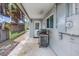 An outdoor patio featuring a barbecue grill, offering a perfect space for outdoor dining and entertaining at 3652 18Th N Ave, St Petersburg, FL 33713